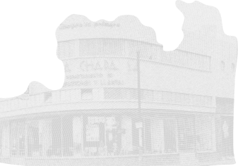 Background decoration showing old storefronts.